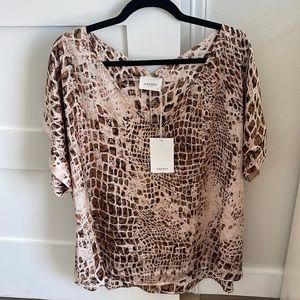 Animal print blouse. Brand new with tags